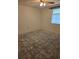 Bedroom featuring neutral colors and a window to let in natural light at 4700 Neptune Rd, Venice, FL 34293