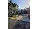 Charming single-story home with a well-maintained lawn and a welcoming covered entrance at 4700 Neptune Rd, Venice, FL 34293