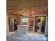 Well-lit kitchen with stainless steel appliances and butcher block countertops at 4700 Neptune Rd, Venice, FL 34293