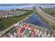 Neighborhood aerial view of homes near highway and waterfront at 4826 San Ortebello Dr, Bradenton, FL 34208