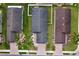 Aerial view of homes featuring well-maintained roofs, yards, and brick driveways at 4826 San Ortebello Dr, Bradenton, FL 34208
