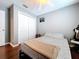 Bedroom with ceiling fan, comfortable bed, closet, and stylish decor at 4826 San Ortebello Dr, Bradenton, FL 34208