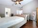 The bedroom has hardwood floors and a decorative headboard at 4826 San Ortebello Dr, Bradenton, FL 34208