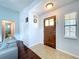 The entryway boasts natural light with a wooden front door that adds character at 4826 San Ortebello Dr, Bradenton, FL 34208