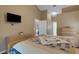 Comfortable bedroom with wood accents, neutral walls, and a decorative quilt at 4926 72Nd E St, Bradenton, FL 34203