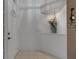 Bright foyer with tiled flooring, recessed lighting, and a decorative shelf with floral arrangement at 4926 72Nd E St, Bradenton, FL 34203