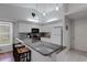 Inviting kitchen with granite countertops, stainless steel appliances, and ample seating at the breakfast bar at 4926 72Nd E St, Bradenton, FL 34203