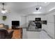 Modern kitchen featuring granite countertops, white cabinets, and stainless steel appliances, perfect for cooking and entertaining at 4926 72Nd E St, Bradenton, FL 34203