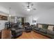 Open-concept living room with hardwood floors and comfortable seating at 4926 72Nd E St, Bradenton, FL 34203