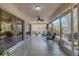 Inviting screened-in patio with comfortable seating and view of backyard at 4926 72Nd E St, Bradenton, FL 34203