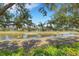 Scenic view of backyard with pond at 4926 72Nd E St, Bradenton, FL 34203