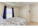 Cozy bedroom with bright window and closet, providing ample storage and natural light at 5102 98Th E Ave, Parrish, FL 34219