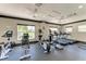 Bright community gym featuring modern exercise equipment and large windows offering ample sunlight at 5102 98Th E Ave, Parrish, FL 34219