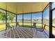 Inviting screened lanai with tranquil lake views perfect for relaxing or entertaining at 5102 98Th E Ave, Parrish, FL 34219