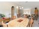 Elegant dining area boasting natural light and seamless flow into the living room at 5955 Ferendina St, North Port, FL 34291