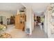 Bright hallway with neutral walls offering smooth transition to other rooms at 5955 Ferendina St, North Port, FL 34291