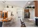 Bright kitchen with stainless steel appliances, granite countertops, and a cozy breakfast nook, ideal for casual dining at 5955 Ferendina St, North Port, FL 34291