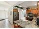 Well-appointed kitchen with stainless steel appliances and solid surface counters at 5955 Ferendina St, North Port, FL 34291