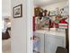 This laundry room features a washer and dryer at 5955 Ferendina St, North Port, FL 34291