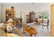 Relaxing living room and dining area with traditional furnishings and natural light at 5955 Ferendina St, North Port, FL 34291