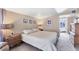 Neutral bedroom offers a calming ambiance with views of the pool area, complete with comfy carpeting and ample natural light at 6013 Murdock Ave, Sarasota, FL 34231