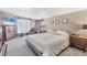 Spacious bedroom with plush carpeting, a sitting area, and neutral walls offering a relaxing retreat at 6013 Murdock Ave, Sarasota, FL 34231