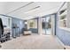 Relaxing bonus room with natural light and direct access to the pool, perfect for leisure and unwinding at 6013 Murdock Ave, Sarasota, FL 34231