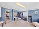 Spacious room with a closet and easy access to the bedroom, offering versatile use as a guest room or dressing area at 6013 Murdock Ave, Sarasota, FL 34231