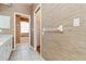 Bathroom features a soaking tub, lots of storage and decorative wall coverings at 6110 Misty Oaks St, Sarasota, FL 34243