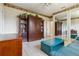 Living room area featuring tile floors, ceiling fan, and nice furniture at 6110 Misty Oaks St, Sarasota, FL 34243