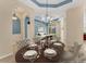 Inviting dining space with views to the living room, perfect for entertaining guests at 6520 38Th E Ln, Sarasota, FL 34243