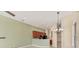 Bright kitchen showcasing ample cabinet space and view into connected living areas at 6520 38Th E Ln, Sarasota, FL 34243