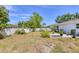 Well-sized backyard offering a concrete patio and a lush lawn at 6611 2Nd Ne Ave, Bradenton, FL 34208
