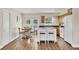 Modern kitchen with center island, white cabinets, stainless appliances, and a breakfast nook at 6611 2Nd Ne Ave, Bradenton, FL 34208