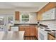 Charming kitchen featuring wooden cabinets and plenty of counter space at 6611 2Nd Ne Ave, Bradenton, FL 34208
