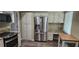 Well-appointed kitchen features stainless steel refrigerator and ample cabinet space at 6902 11Th W Ave, Bradenton, FL 34209