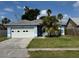 Charming single-story home with well-maintained lawn and a two car garage at 6928 43Rd E Ct, Sarasota, FL 34243