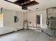 Unfinished garage with large windows and open space for storage at 6928 43Rd E Ct, Sarasota, FL 34243