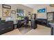Office space with dark cabinetry, a large desk, natural lighting, and carpeted floors at 7311 7Th W Ave # 7311, Bradenton, FL 34209