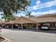 Attached carport area for the community in front of several apartment buildings at 803 Fairwaycove Ln # 102, Bradenton, FL 34212