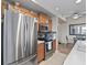 Well-equipped kitchen with stainless steel appliances and a view into the dining space at 803 Fairwaycove Ln # 102, Bradenton, FL 34212