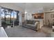 Inviting living room with an open floor plan, seamlessly flowing into the kitchen area at 803 Fairwaycove Ln # 102, Bradenton, FL 34212