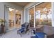 Outdoor patio with comfortable seating, perfect for relaxing and enjoying the serene surroundings at 803 Fairwaycove Ln # 102, Bradenton, FL 34212