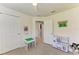 Bright bedroom with ceiling fan, closet, and toys; ideal for a room at 9819 46Th E Ct, Parrish, FL 34219