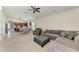 Expansive living room with open layout to kitchen, and comfortable seating area at 9819 46Th E Ct, Parrish, FL 34219