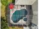 Aerial view highlights the screened pool and spa, perfect for relaxing in this backyard oasis at 1008 83Rd Nw St, Bradenton, FL 34209