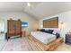 Bright bedroom featuring a unique platform bed, stylish decor, and a ceiling fan at 1008 83Rd Nw St, Bradenton, FL 34209