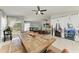 Spacious dining room featuring a wooden table and chairs with plenty of natural light and an open floor plan at 1008 83Rd Nw St, Bradenton, FL 34209