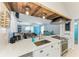 Beautiful kitchen with stainless appliances and a view of the living room and pool at 1008 83Rd Nw St, Bradenton, FL 34209