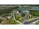An aerial view of community featuring a waterpark, clubhouse, and winding roads at 11713 Chevelon Ln, Parrish, FL 34219